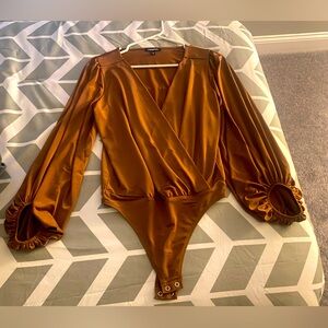 Dark tan long sleeve body suit by Express. Low cut. XS.